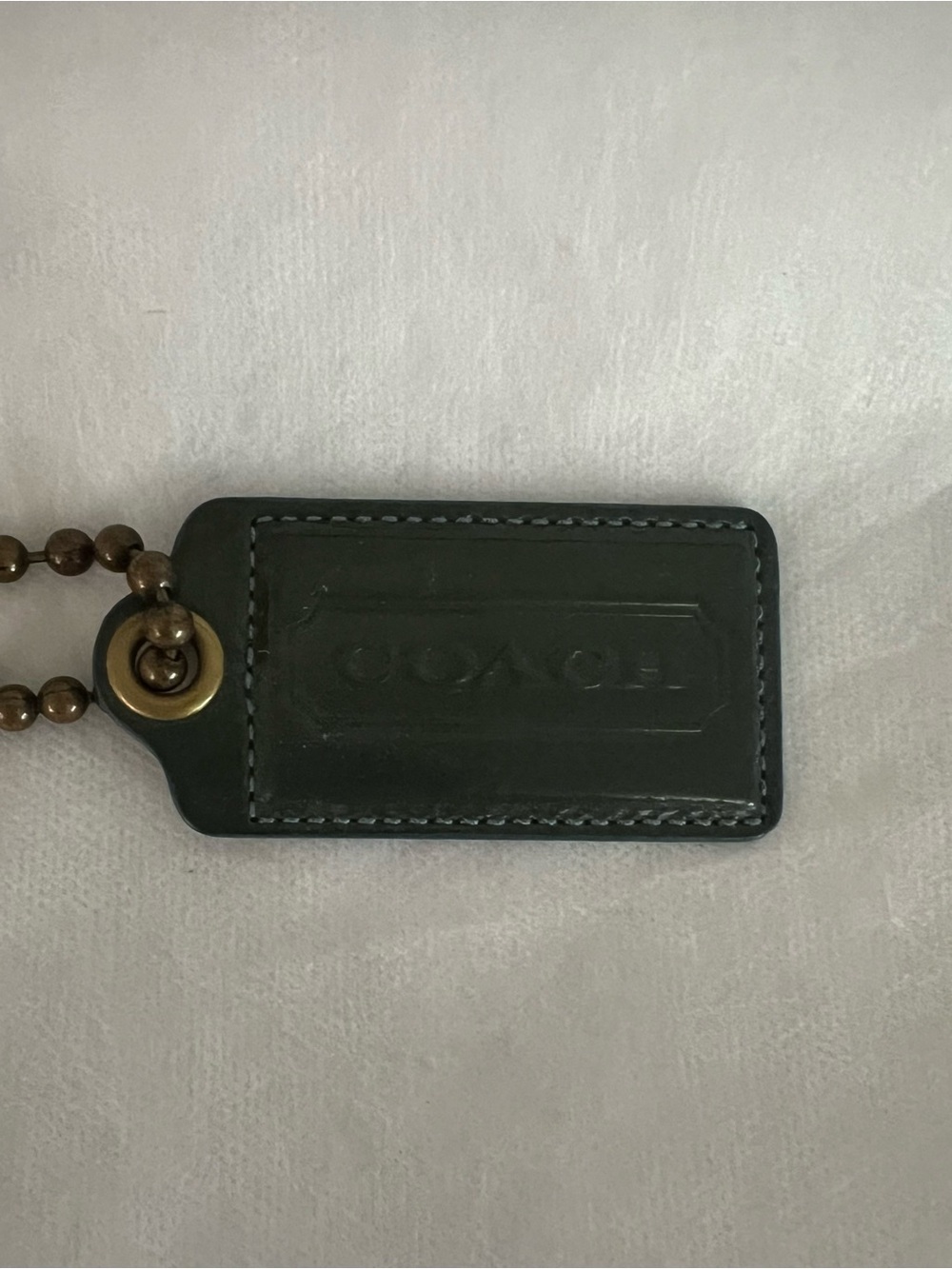 Coach Dark Green Patent Leather Hangtag